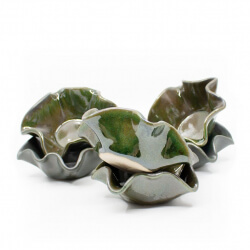 handgemachte Muffinformen in grün Stapel